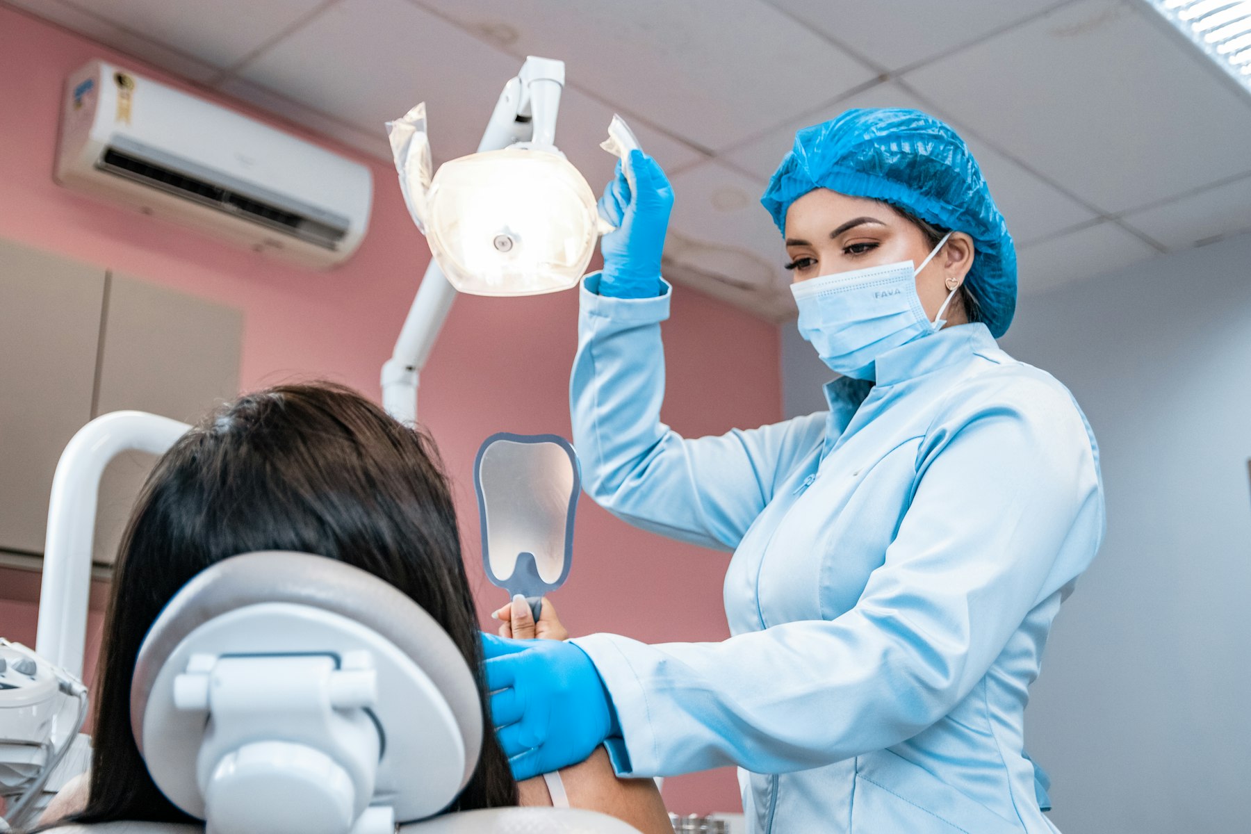 Patient having a check-up in a bright clinic